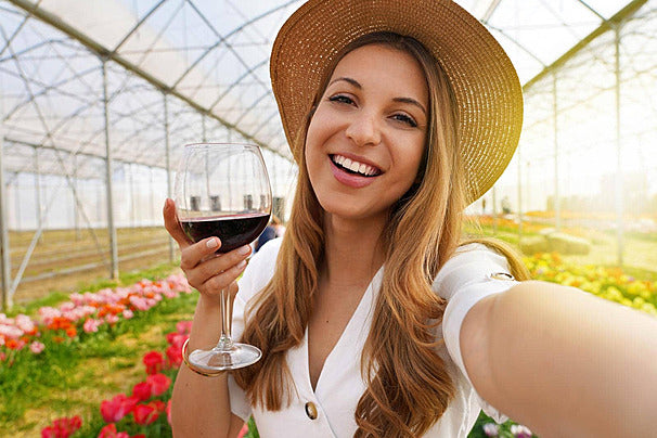 files/pngtree-attractive-young-woman-takes-a-weekend-sip-outdoors-a-selfie-with-wine-glass-in-hand-photo-image_46045470.jpg